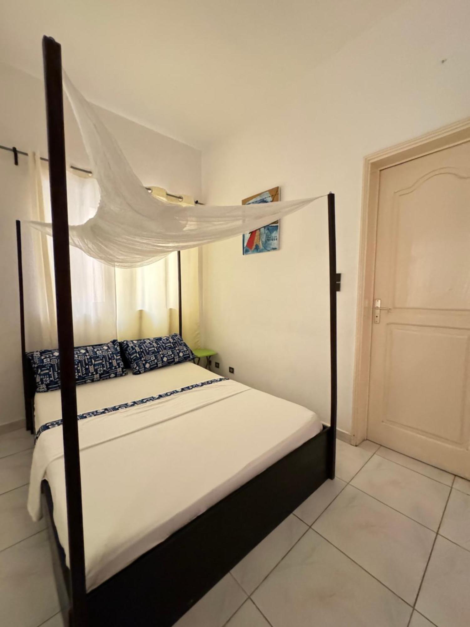 Guesthouse Cocotiers Cotonou Exterior photo